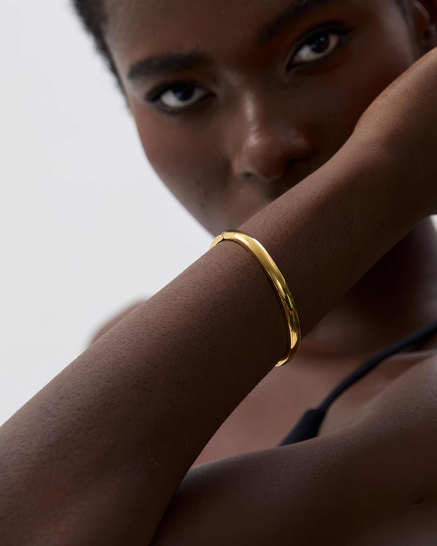 Aurelia Minimalist Bangle - Gold - Angled View - Ohh Glam