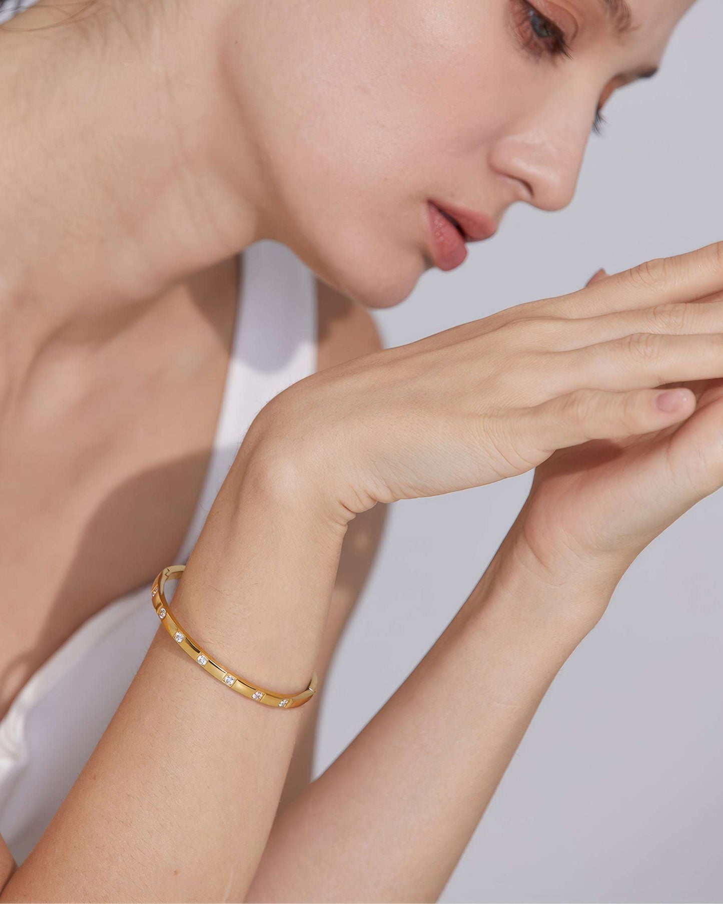 STELLA Crystal Bangle Bracelet - Gold - Angled View - Ohh Glam